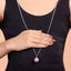 Front view of a 925 sterling silver harmony ball bola necklace, a round pendant for expecting mothers on a long chain.