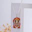Front view of the Bhurakhiya Hanumanji 925 silver pendant, showing detailed, vibrant enamel (mina) work on a white