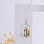 Front view of the Jalaram Bapa 925 silver pendant, showing the colorful enamel (Mina) work and diamond details.