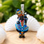 Jeweled Krishna Pendant on Wood Slice-crop.jpg