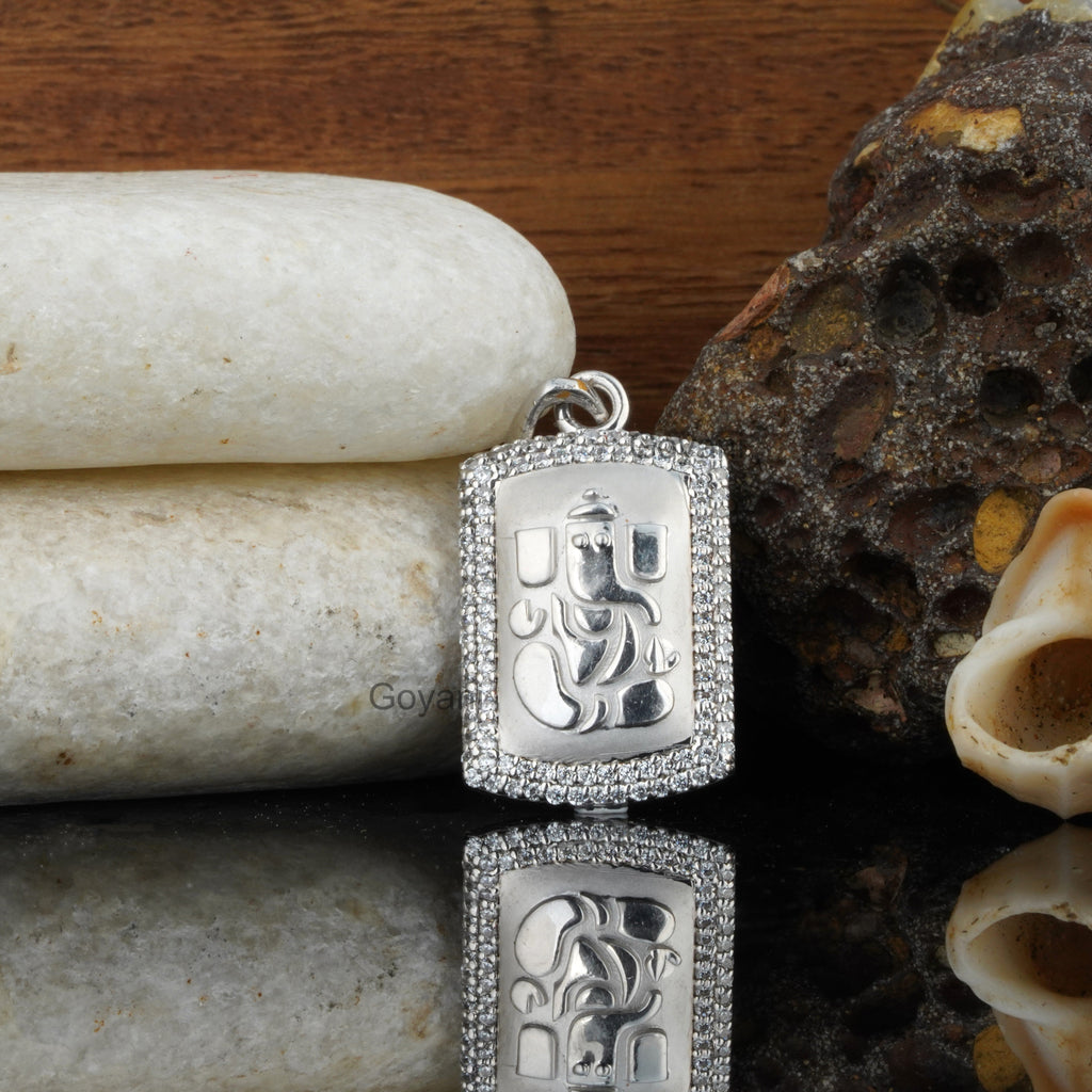 Close-up of a detailed 925 silver Lord Ganesh pendant with a sparkling diamond, ideal for spiritual daily wear.