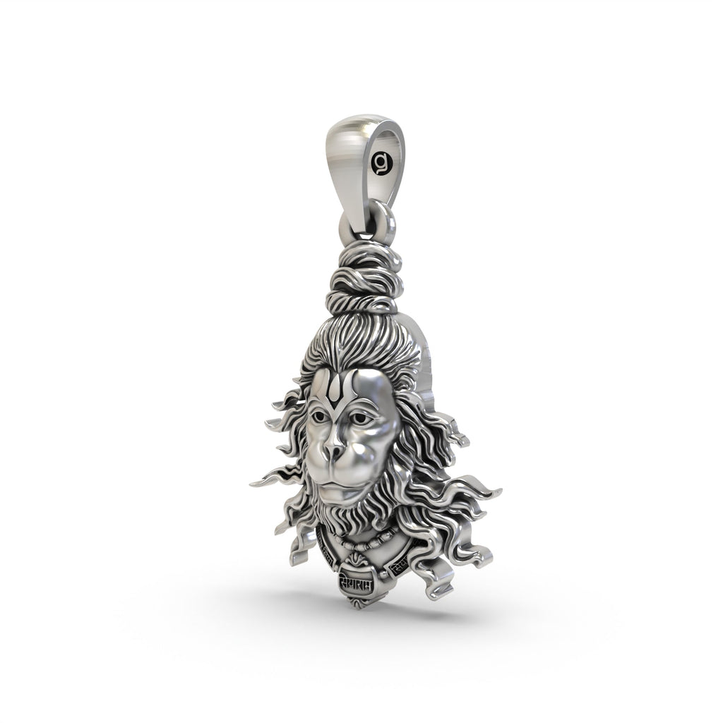 Angled perspective of the 925 Silver Hanumanji Face Pendant, highlighting the oxidized finish and dimensional carving.