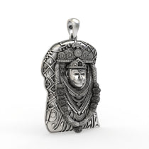 A close-up shot of the Bhurakhiya Hanuman pendant in sterling silver, focusing on the deity's facial features.