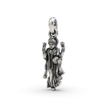 An angled profile of the Silver Standing Lakshmi Pendant, highlighting its dimensional craftsmanship and antique look.