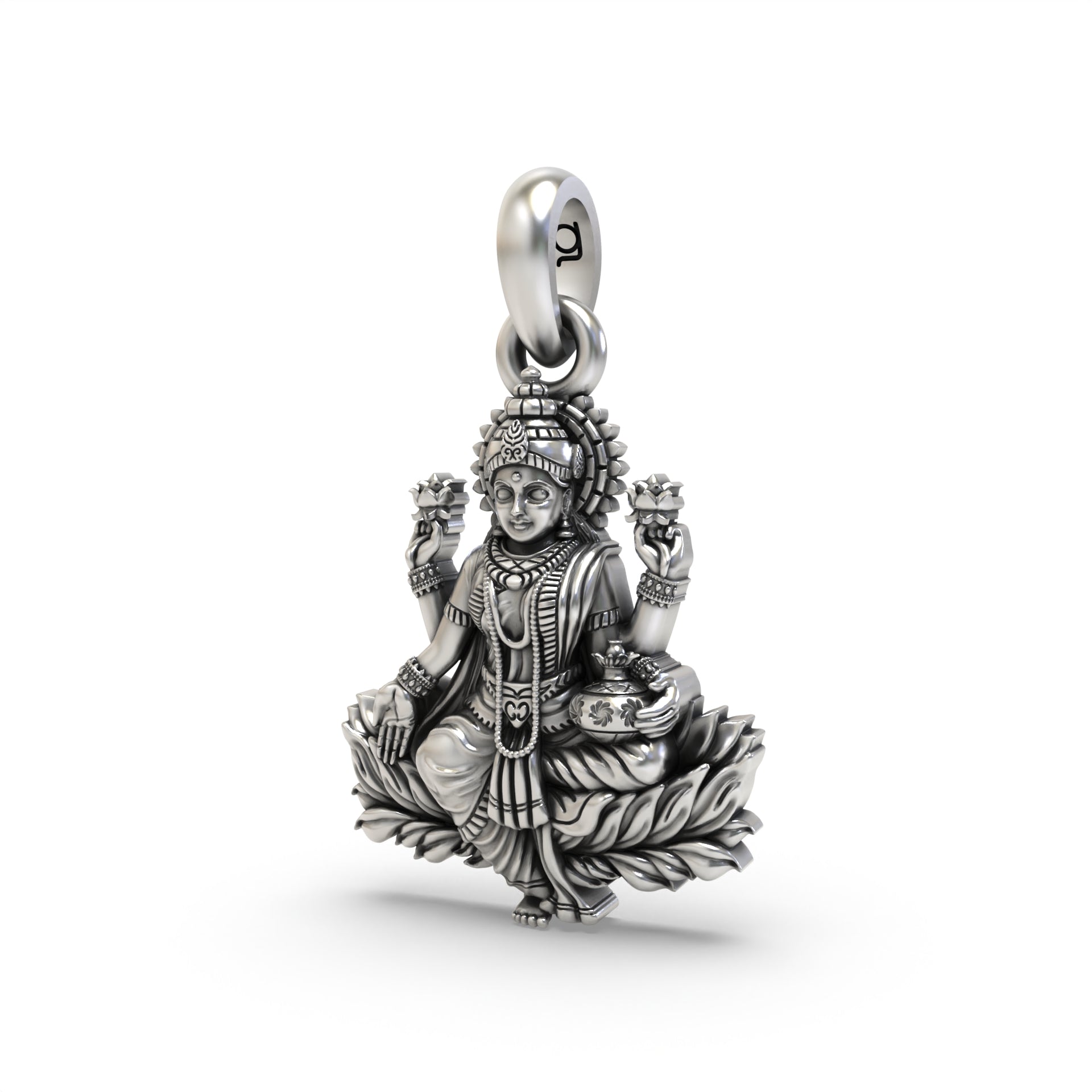 Detailed close-up of the Lakshmi silver pendant, highlighting the antique oxidized finish on the 925 sterling silver.