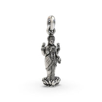 Close-up of the Lakshmi on lotus silver pendant, highlighting the antique oxidized texture and fine craftsmanship.