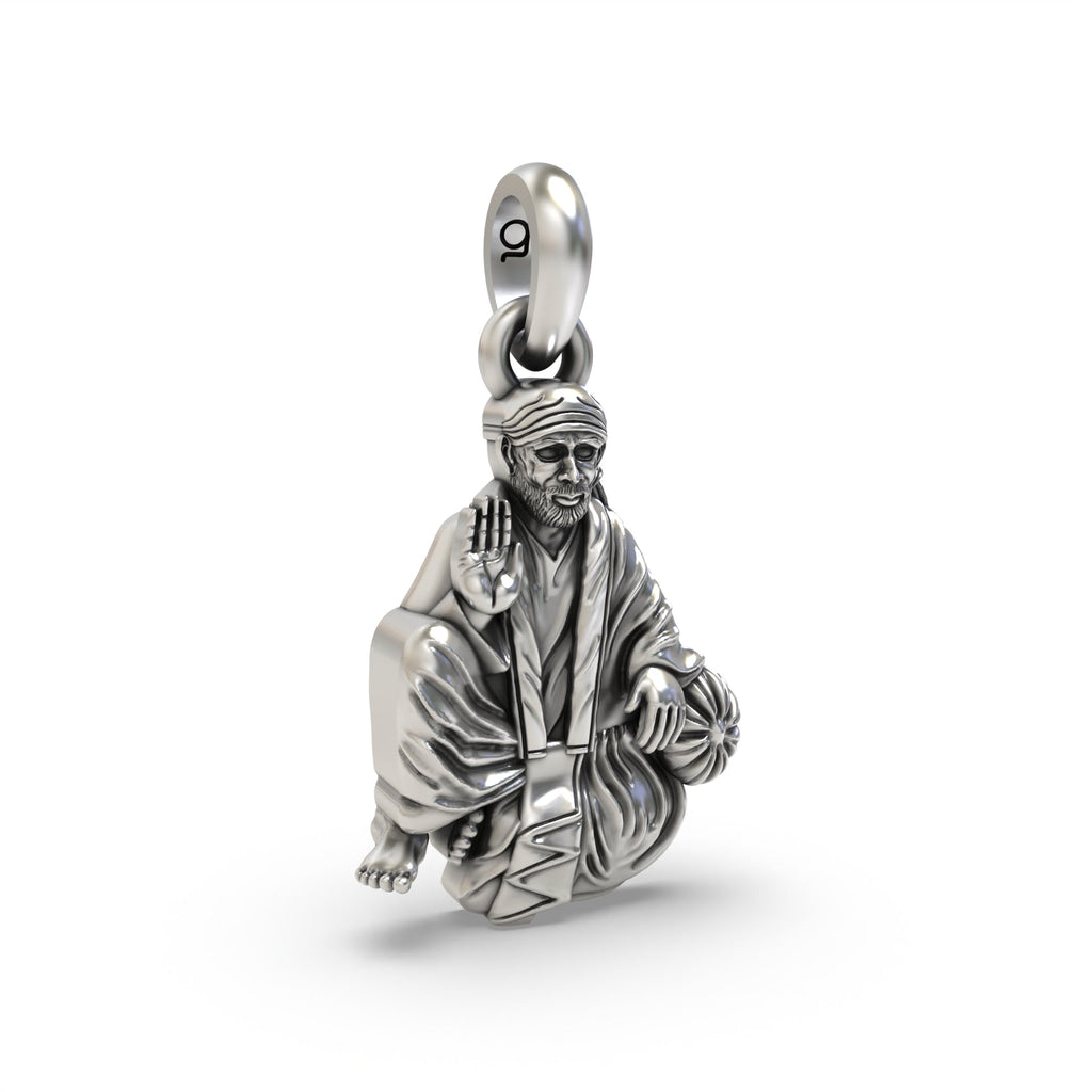 Close-up detail of the Sai Baba of Shirdi pendant highlighting the serene expression and the antique oxidized 925 silver