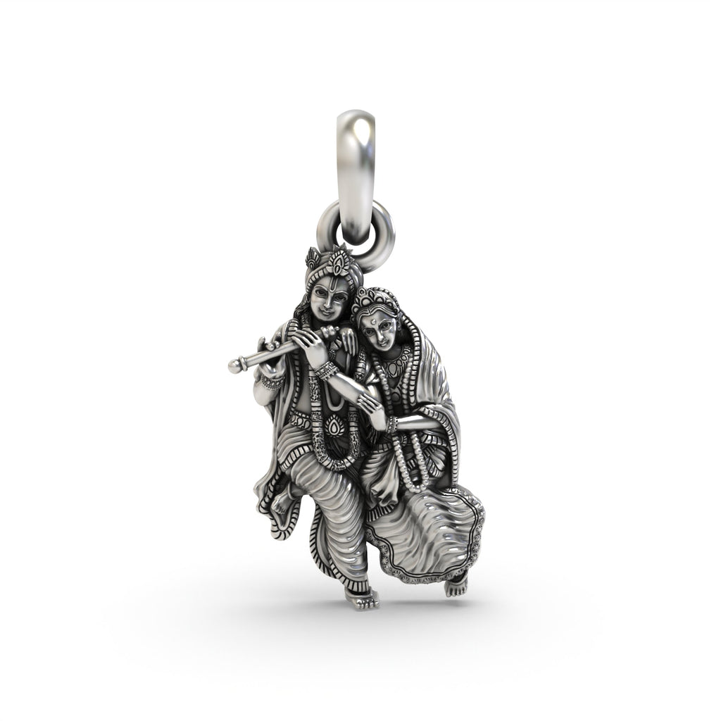 Front view of the Alankar 925 sterling silver Radha Krishna pendant with a detailed, oxidized finish.