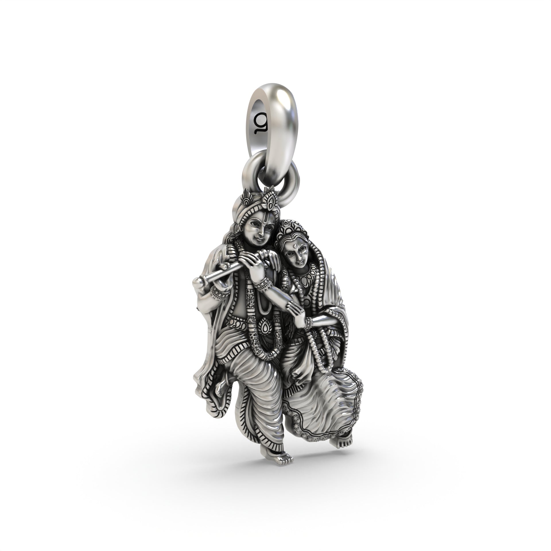 A close-up of the silver Radha Krishna pendant, focusing on the antique oxidized finish and serene expressions.
