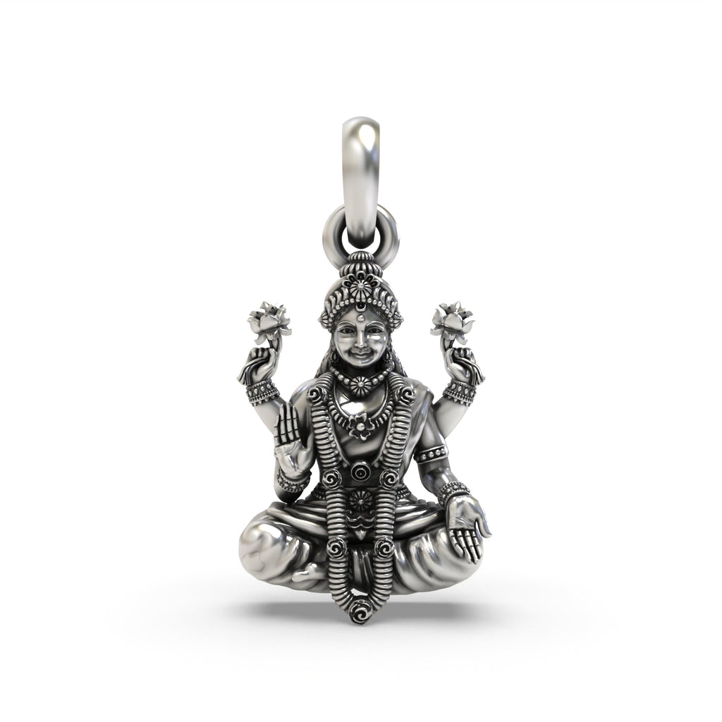 Front view of the Alankar Sterling Silver Lakshmi Pendant, showcasing the detailed oxidized finish of the goddess.