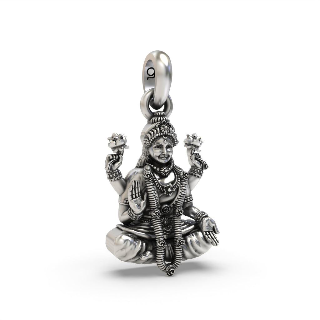 Angled profile of the oxidized Lakshmi pendant, showing its hollow back design for lightweight comfort and daily wear.