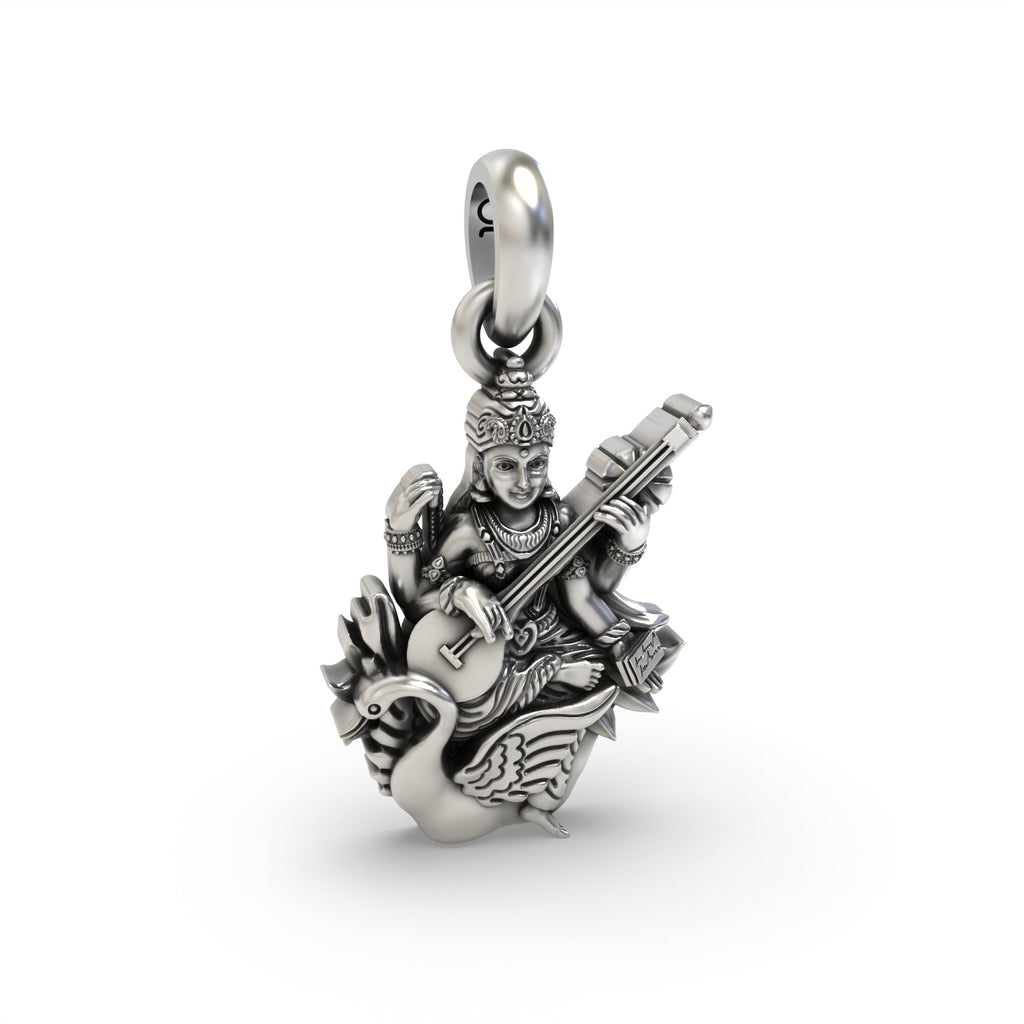A 925 sterling silver Saraswati Maa pendant shown for scale, showcasing its elegant size for daily spiritual wear.