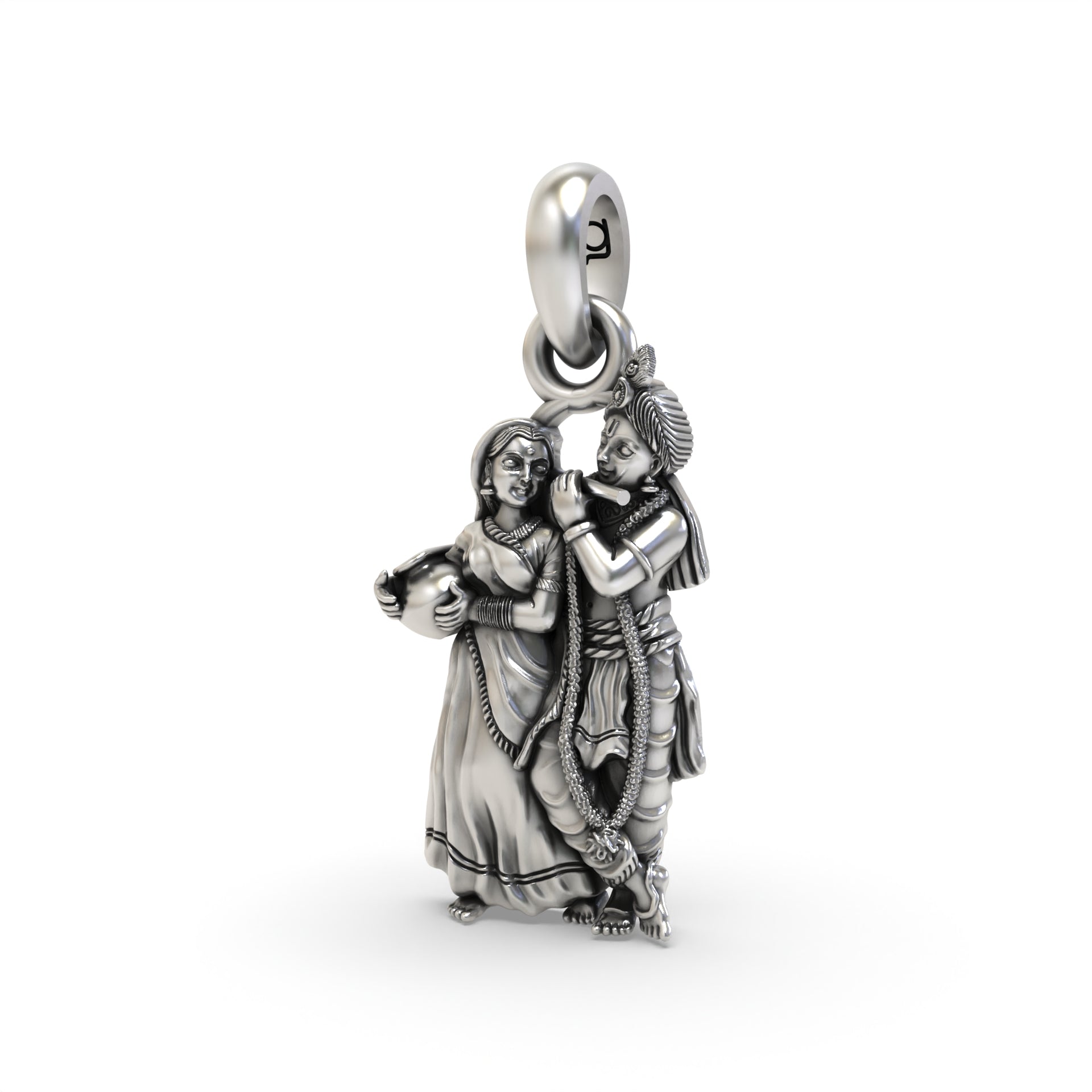 Close-up detail of the intricate carvings on the Radha Krishna 925 oxidized silver pendant, showing their divine forms.