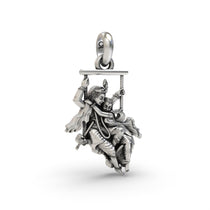 Close-up detail of the 925 silver Radha Krishna on a swing pendant, focusing on the antique oxidized finish and expressions.