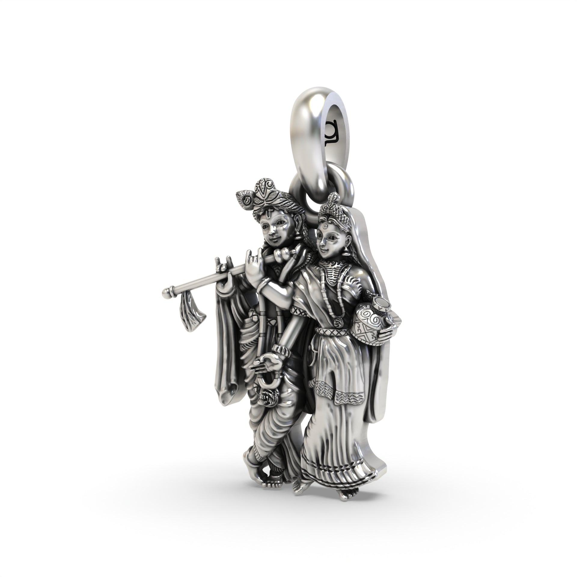 An angled view of the Radha Krishna silver pendant highlighting the intricate details and fine craftsmanship from Alankar.