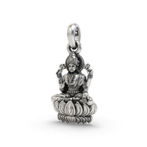 Angled view of the Lakshmi on Lotus pendant in 925 silver, showing the detailed craftsmanship and the oxidized finish.