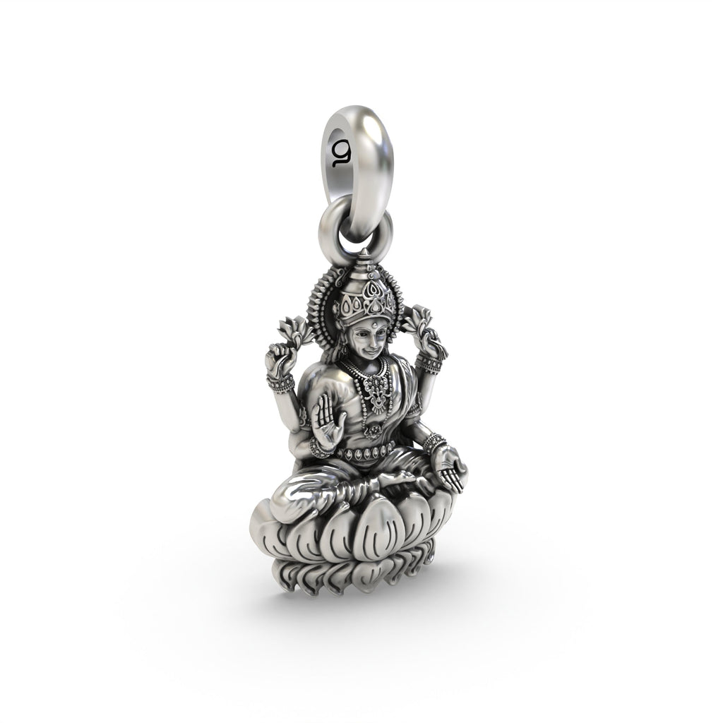 A view of the oxidized Silver Lakshmi on Lotus pendant, showcasing its hollow back design for comfortable, lightweight wear.