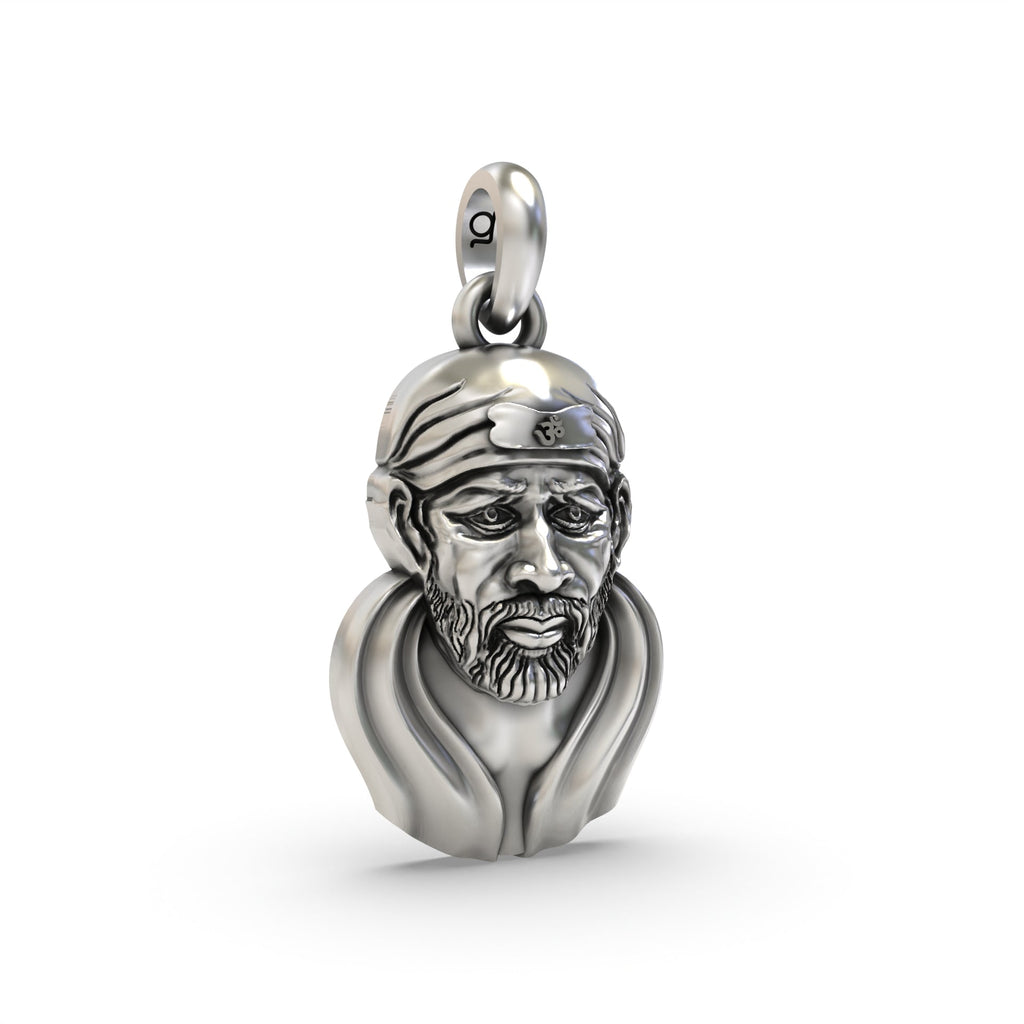 Angled side profile view of the Sai Baba face silver pendant, displaying the depth and contours of the sacred design.