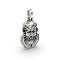 The hollow back of the sterling silver Sai Baba face pendant, designed to be lightweight and comfortable for all-day wear.