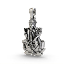 Angled shot of the 925 silver Bala Tripurasundari pendant, showing the intricate details of the goddess figure.