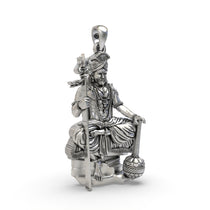 Close-up shot of the Alankar 925 silver Muniswarar locket, focusing on the fine craftsmanship and textures.