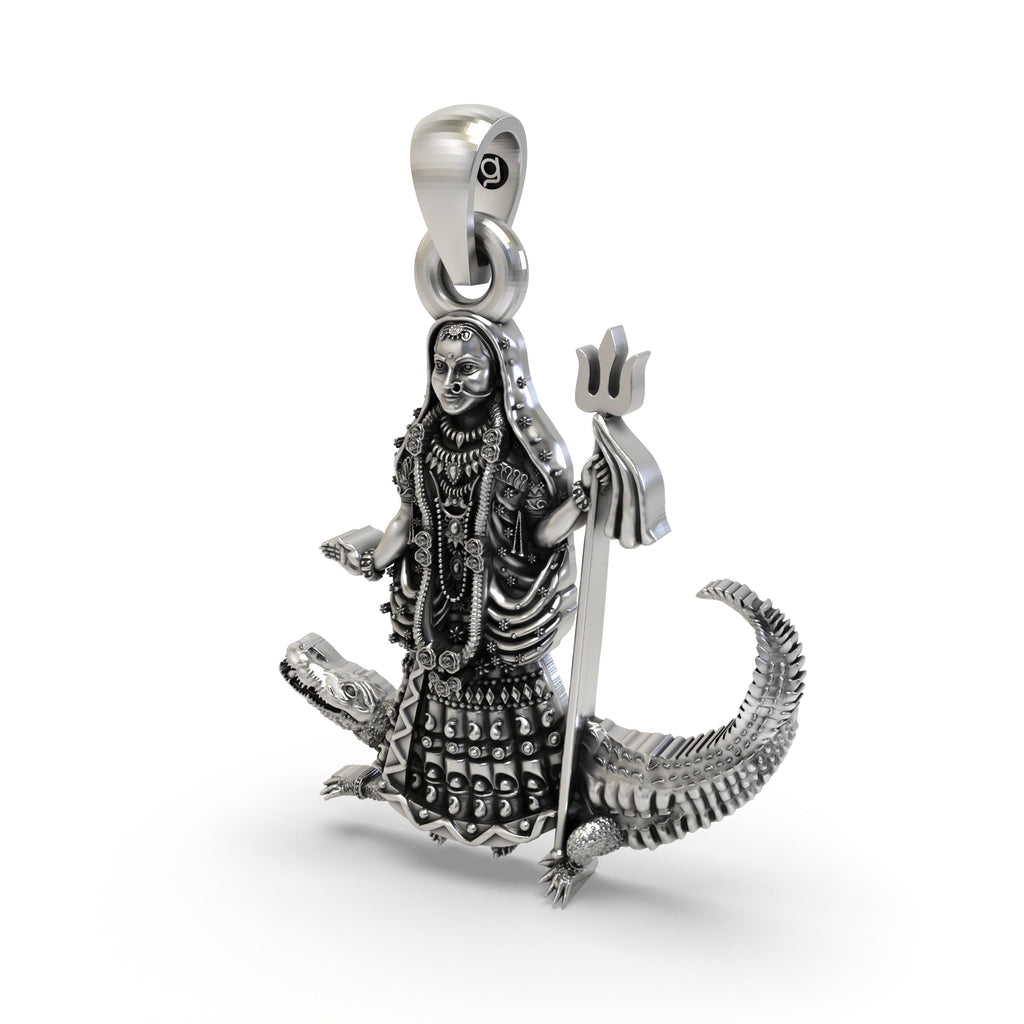 The lightweight 925 sterling silver Khodiyar Maa pendant held in hand to show its scale and hollow back design for comfort.
