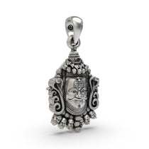 A close-up of the Silver Mahakal Pendant, focusing on the sacred symbols of Lord Shiva from the Ujjain temple.