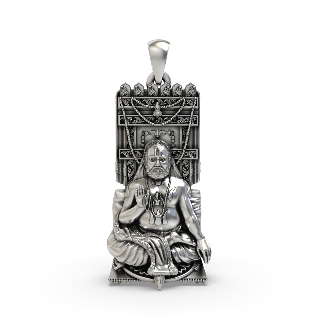 Front view of the 925 oxidised silver Raghavendra Tirtha pendant with intricate detailing of the spiritual guru.