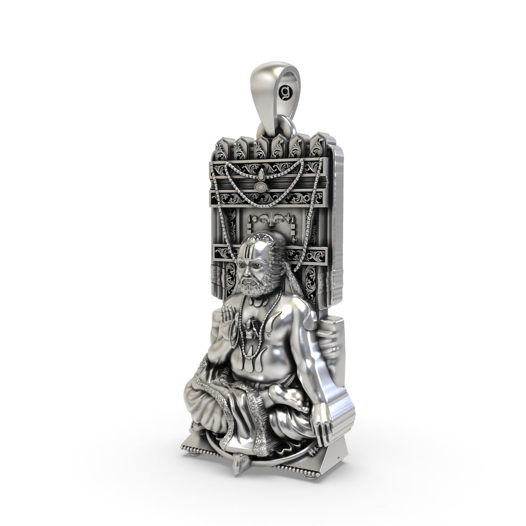 Close-up detail of the antique finish on the 925 sterling silver Raghavendra Tirtha spiritual pendant for devotees.