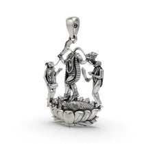 Angled profile of the Chhinnamastika Devi pendant, showcasing the intricate details and antique finish on 925 silver.