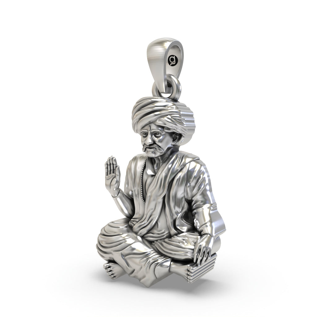 A close-up shot of the Bhoja Bhagat pendant, focusing on the detailed antique workmanship on the 925 silver surface.