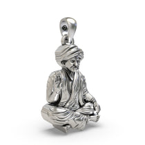 Side view of the Bhoja Bhagat silver pendant, displaying its depth, dimensions, and the unique oxidised finish.