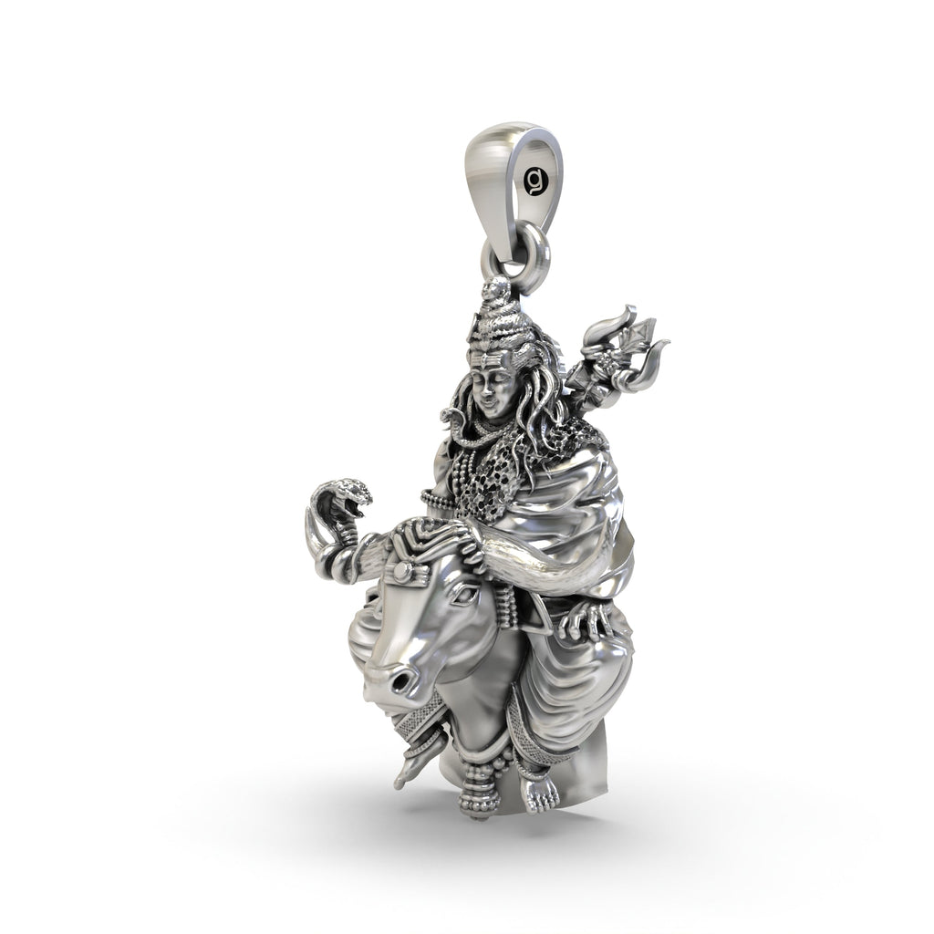 An angled side profile of the oxidised 925 silver Shiva on Nandi pendant, showing its dimensional form and hollow back.