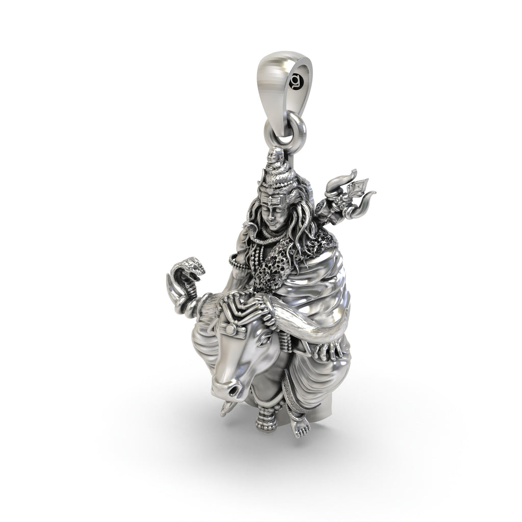 Close-up detail of the Shiva on Nandi pendant in sterling silver, highlighting the antique texture of the oxidised surface.