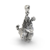 Close-up detail of the Shiva on Nandi pendant in sterling silver, highlighting the antique texture of the oxidised surface.
