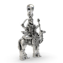 Close-up detail of the Momai Maa pendant, showcasing the serene facial expression carved in oxidized 925 sterling silver.