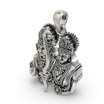 The Ram Sita pendant in 925 sterling silver held to show its size and lightweight hollow back design.