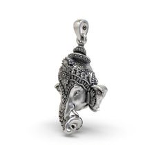Angled shot of the handcrafted 925 Silver Ganpati Face Pendant, highlighting the three-dimensional details of the deity.