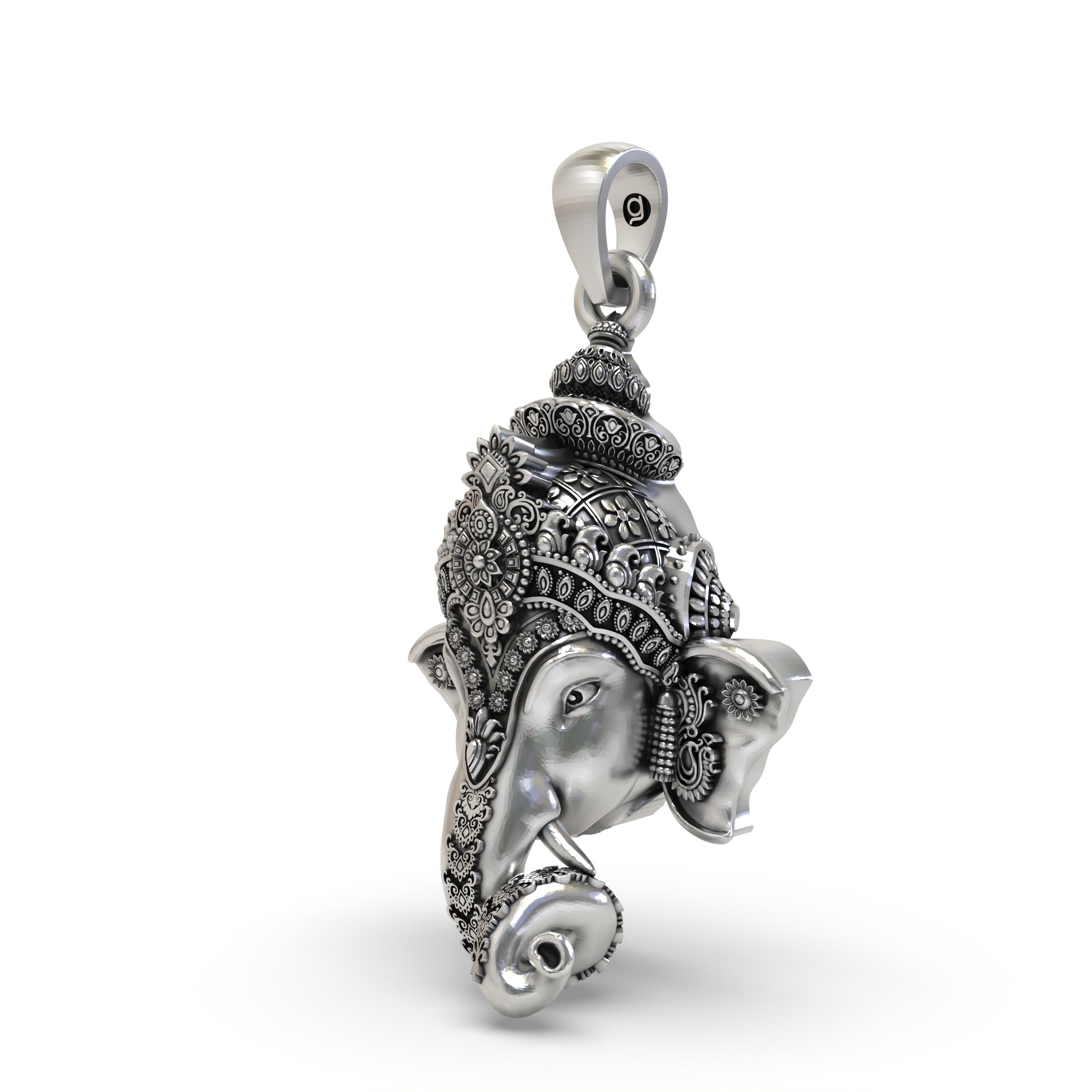 Angled shot of the handcrafted 925 Silver Ganpati Face Pendant, highlighting the three-dimensional details of the deity.