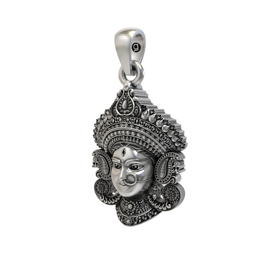 Angled profile view of the oxidized Durga Maa Face Pendant showing the crown details and 925 sterling silver finish.
