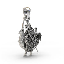Angled profile of the sterling silver Bahuchar Maa pendant, showing the depth of the oxidized finish and craftsmanship.