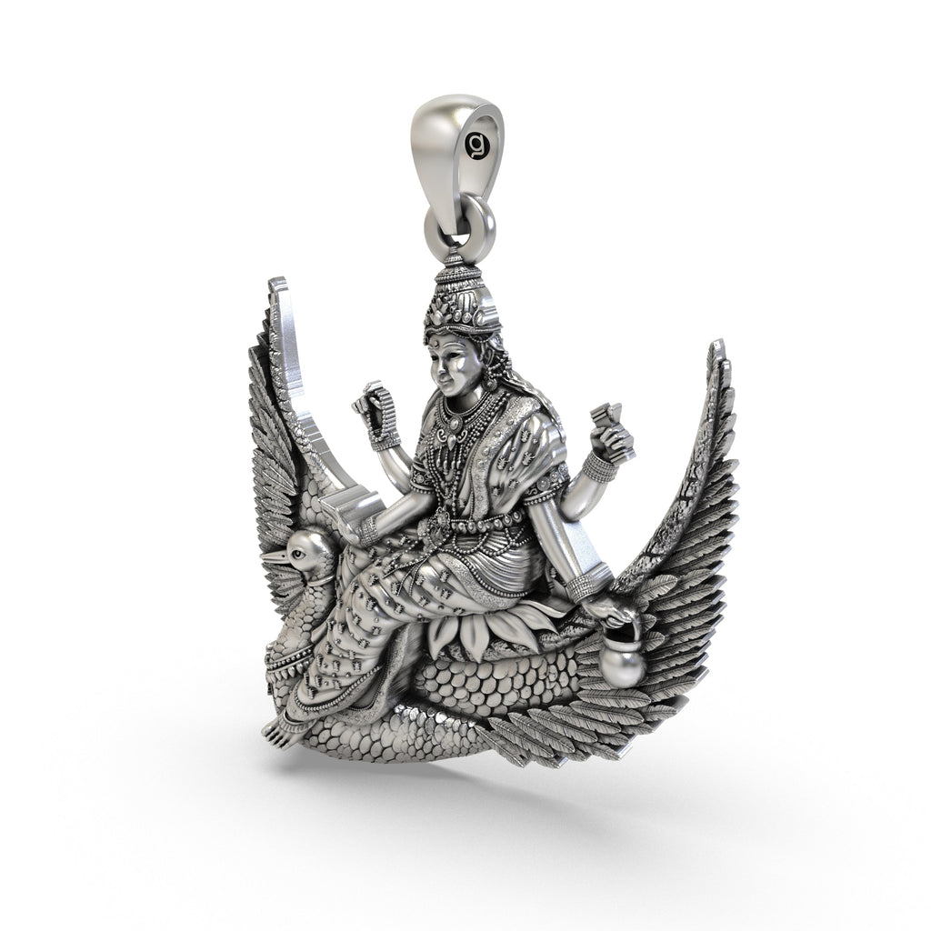 Angled view of the Brahmani Mata silver locket, highlighting the divine goddess figure and antique finish.