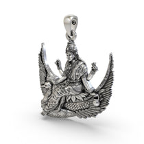 Angled view of the Brahmani Mata silver locket, highlighting the divine goddess figure and antique finish.