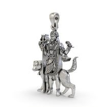 An angled side profile of the sterling silver Kaal Bhairav pendant, showcasing its powerful and divine design details.