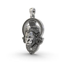 Side profile of the sterling silver Hanumanji face pendant, showing the depth and detailed craftsmanship of the jewel.