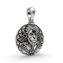 The 925 sterling silver Hanuman coin pendant with its antique oxidized look, a spiritual accessory for daily protection.