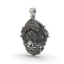 Angled view of the oxidized 925 sterling silver Kirtimukha pendant, highlighting its sacred 3D craftsmanship.