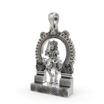 Angled profile of the Chathan Swamy divine protection amulet in sterling silver, highlighting its dimensional craftsmanship.