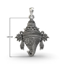 A 925 sterling silver Vishnu Shankh pendant with a beautiful oxidized look, worn to showcase its elegant design.