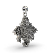 Close-up of the antique oxidized finish on the handcrafted Panchajanya Vishnu Shankh silver pendant.